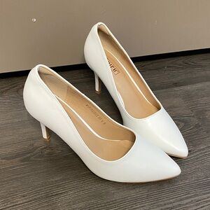 White pointed closed toe high heels
